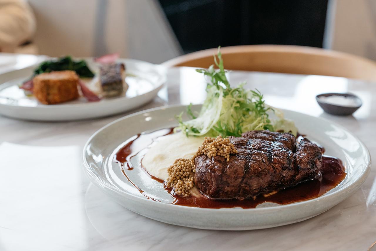 Art Series - The Chen Box Hill Exteriör bild A steak at the restaurant