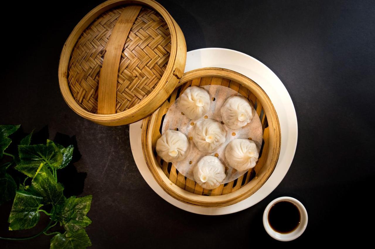 Art Series - The Chen Box Hill Exteriör bild A steamer with dim sum